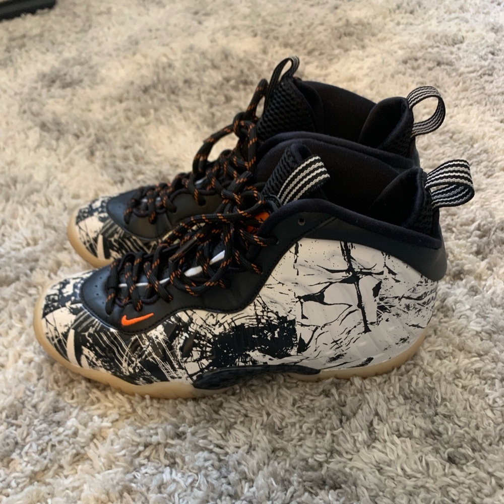 Nike Black and White Athletic Shoes with Orange Accents